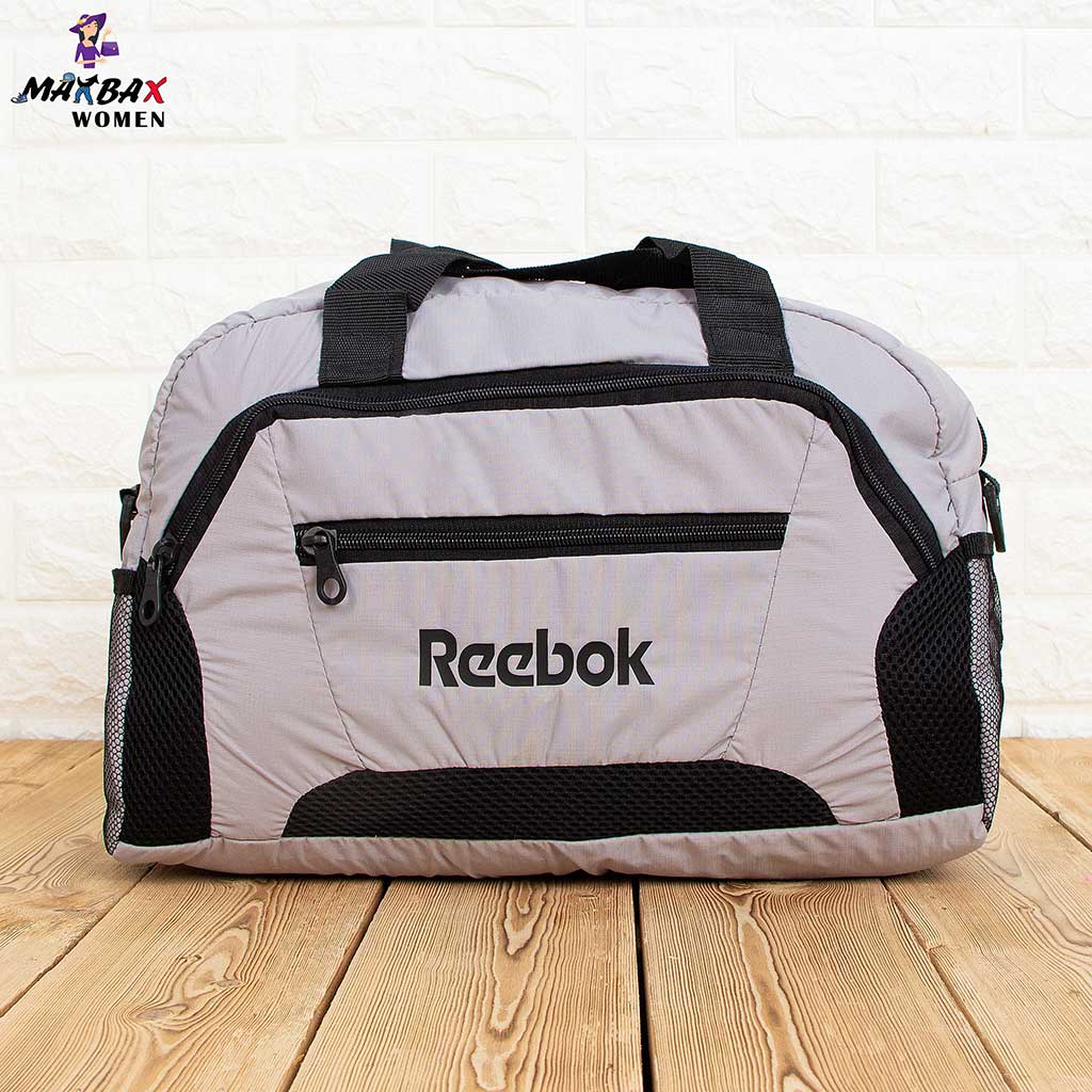 reebok whizz slip on